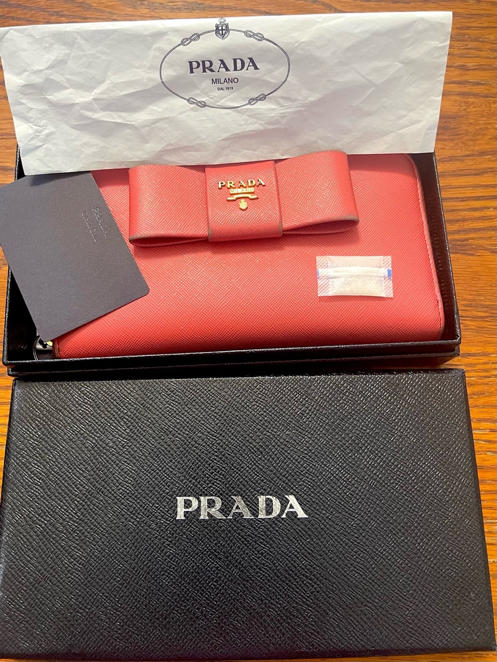 Prada Coral Bow Zip Wallet in Coral Pink Saffiano Leather